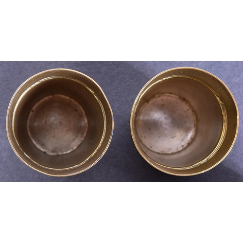 73 - A set of x6 WWII Second World War German Waffen SS Schnapps cups. Brass with engraved SS runes and r... 