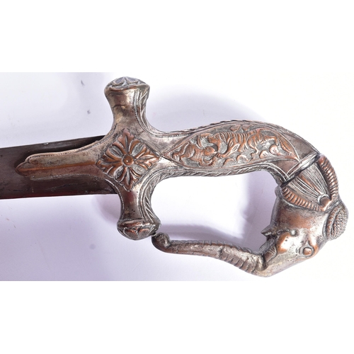 95 - A 19th Century Indian Shamshir sword with silvered copper hilt in the form of an elephants head and ... 