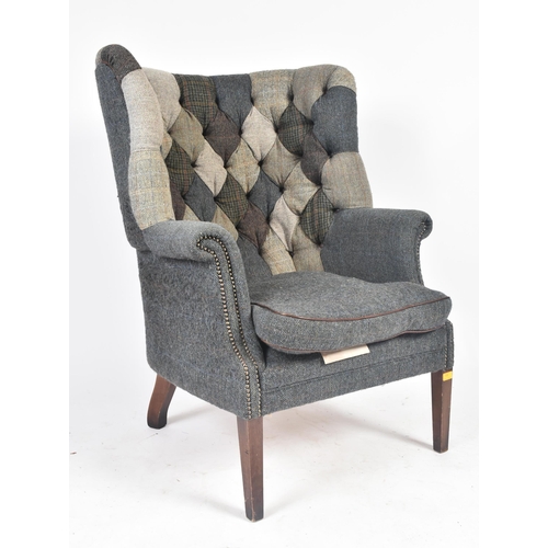 130 - Harris Tweed Mackenzie - A contemporary designer wingback fireside armchair. The chair having a mult... 