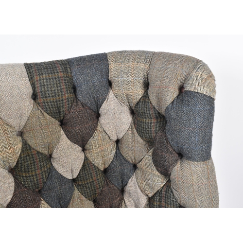 130 - Harris Tweed Mackenzie - A contemporary designer wingback fireside armchair. The chair having a mult... 