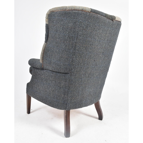 130 - Harris Tweed Mackenzie - A contemporary designer wingback fireside armchair. The chair having a mult... 