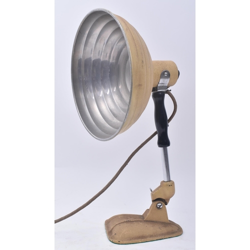 132 - Pifco - A retro 20th century 1960s infrared heat lamp having a beehive aluminium light shade in crea... 