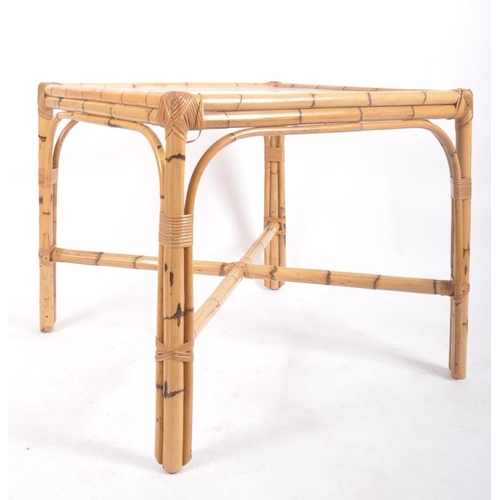 133 - A vintage 20th century bamboo dining / kitchen table and two chairs. The table of square from with i... 