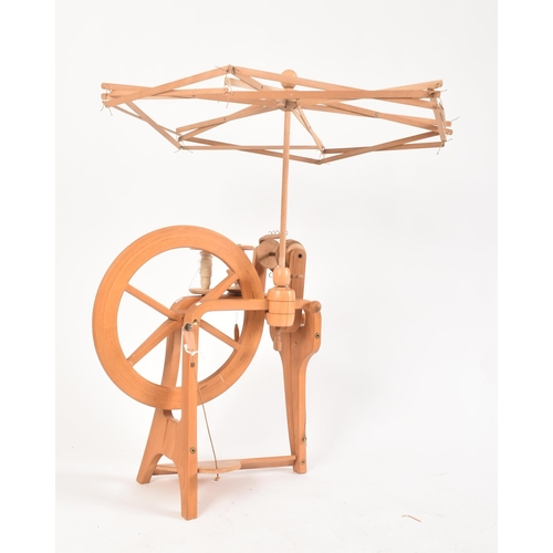 190 - Frank Herring & Sons - The Herring Spinning Wheel - A vintage 20th century beech bentwood floor spin... 