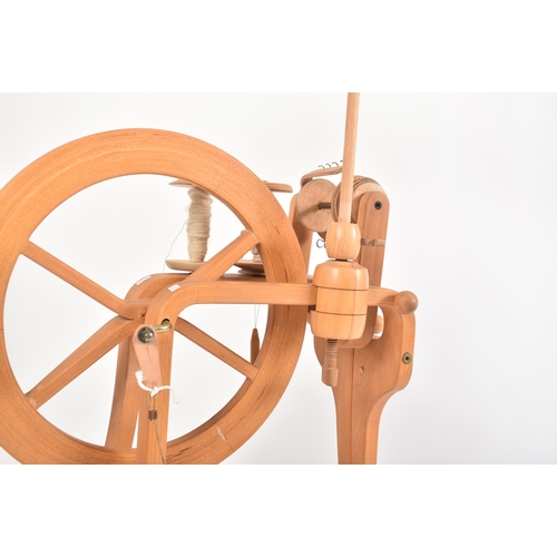 190 - Frank Herring & Sons - The Herring Spinning Wheel - A vintage 20th century beech bentwood floor spin... 