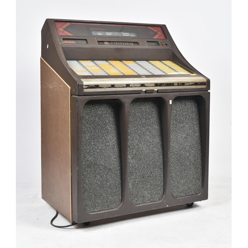 193 - Rock-Ola - Model 483 - A vintage 20th century circa 1981 Rock-Ola 483 juke box / jukebox. The compac... 