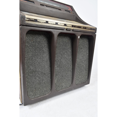 193 - Rock-Ola - Model 483 - A vintage 20th century circa 1981 Rock-Ola 483 juke box / jukebox. The compac... 