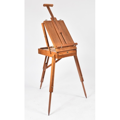 194 - A vintage 20th century folding collapsing architect's board / easel. The board raised on tapering su... 