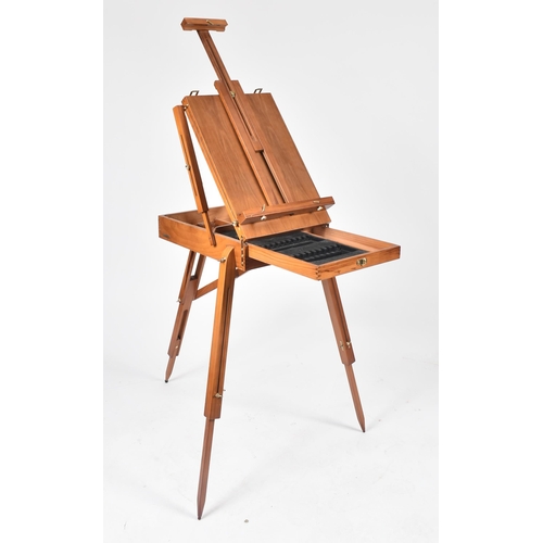 194 - A vintage 20th century folding collapsing architect's board / easel. The board raised on tapering su... 