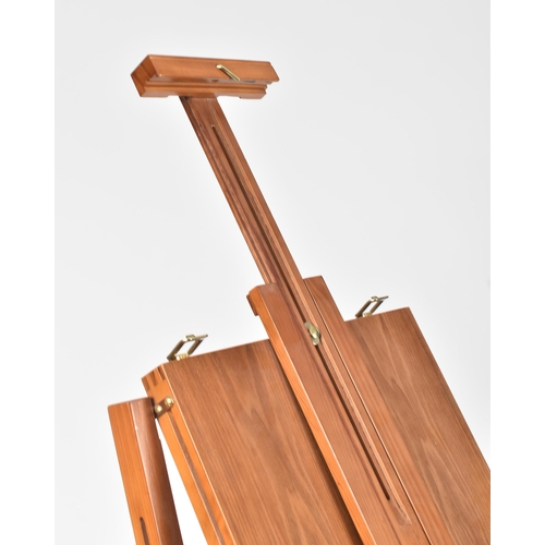 194 - A vintage 20th century folding collapsing architect's board / easel. The board raised on tapering su... 