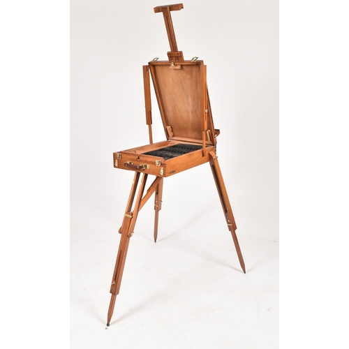 194 - A vintage 20th century folding collapsing architect's board / easel. The board raised on tapering su... 