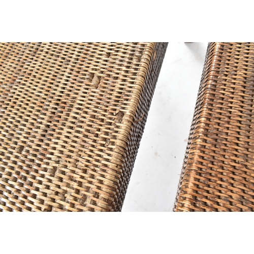 197 - A pair of contemporary British Modern Design bamboo rattan wicker console hall tables. Each table ha... 