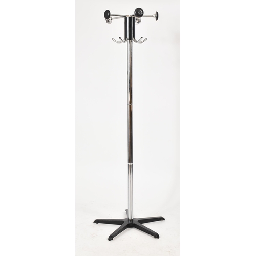 341 - A retro 20th century Space Age free standing coat and hat stand. Upright form with a series of protr... 