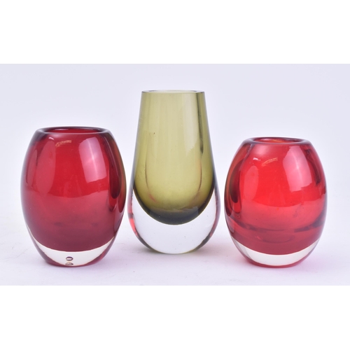 342 - Whitefriars - A selection of three retro 20th century glass vase. The lot comprising of two ruby red... 