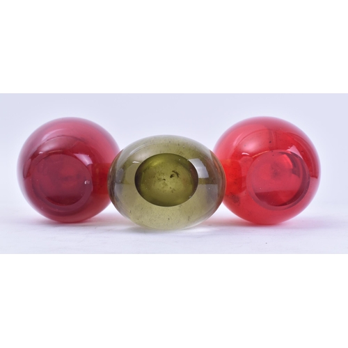 342 - Whitefriars - A selection of three retro 20th century glass vase. The lot comprising of two ruby red... 