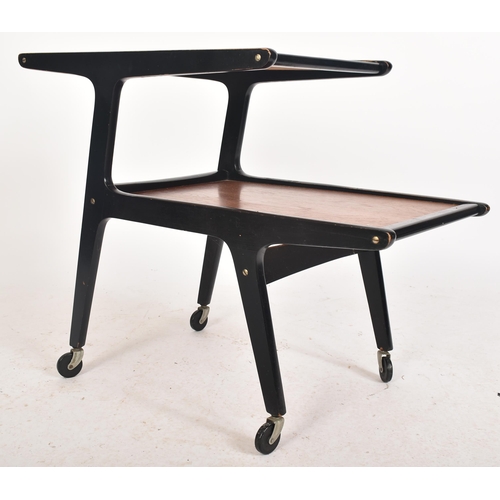 347 - Manner of Yngve Ekström - A retro mid 20th century two tier tea / drinks cocktail trolley. The troll... 