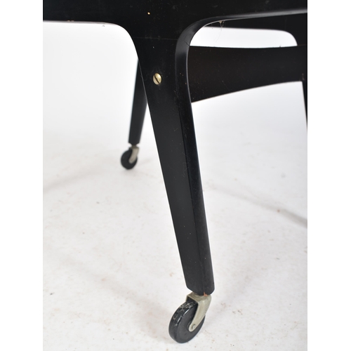 347 - Manner of Yngve Ekström - A retro mid 20th century two tier tea / drinks cocktail trolley. The troll... 