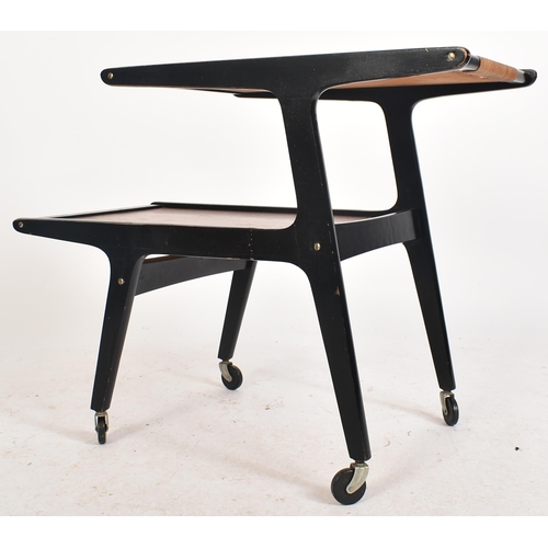 347 - Manner of Yngve Ekström - A retro mid 20th century two tier tea / drinks cocktail trolley. The troll... 