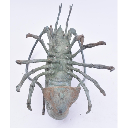 46 - A 20th century cast bronze sculpture of a lobster. The lobster with green - blue patina. Unsigned. M... 