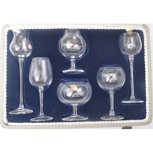 49 - Moser Praha Glass - A vintage 20th century cased set of miniature Bohemia Moser Club's Physiognomica... 