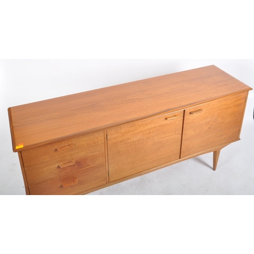 59 - Alfred Cox - A retro mid 20th century 1960s teak wood sideboard credenza. The sideboard of simple fo... 