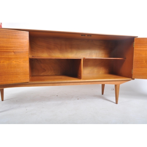 59 - Alfred Cox - A retro mid 20th century 1960s teak wood sideboard credenza. The sideboard of simple fo... 