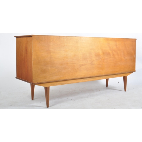 59 - Alfred Cox - A retro mid 20th century 1960s teak wood sideboard credenza. The sideboard of simple fo... 