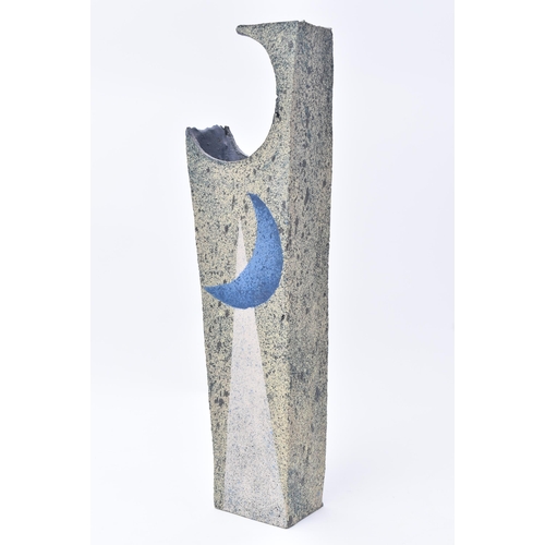 61 - Paul Philp (b. 1941) - Studio Pottery - A tall abstract shaped decorative vase. The vase having a cr... 