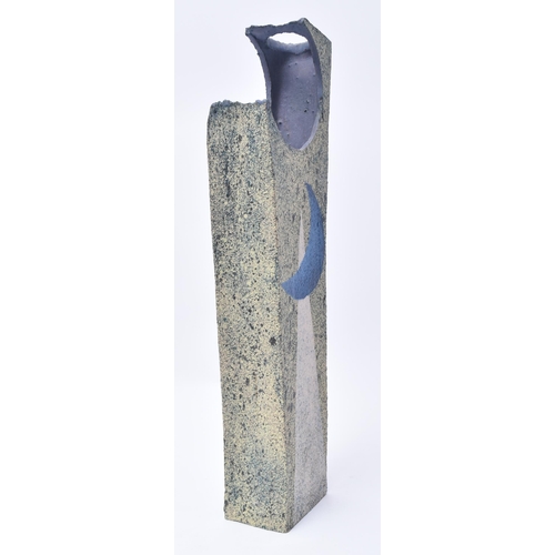 61 - Paul Philp (b. 1941) - Studio Pottery - A tall abstract shaped decorative vase. The vase having a cr... 