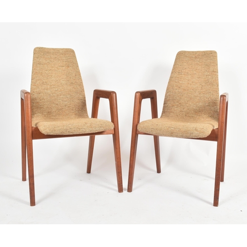 64 - Kai Kristiansen for Schou Andersen - A pair of retro mid 20th century Danish teak framed armchairs /... 