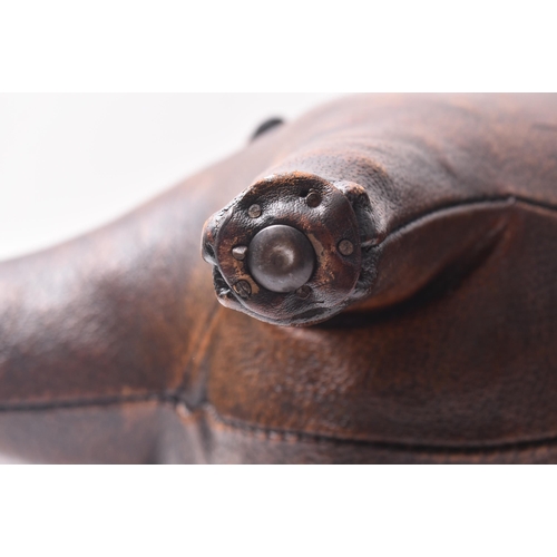 7 - Liberty's of London (manner of) - A 20th century high end designer hand stitched leather pig footsto... 