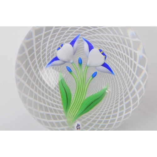 103 - Baccarat - A 20th century circa 1970s French Baccarat glass paperweight. The paperweight having heli... 