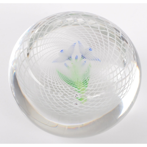 103 - Baccarat - A 20th century circa 1970s French Baccarat glass paperweight. The paperweight having heli... 