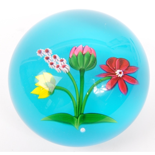 106 - Baccarat - A 20th century circa 1970s French Baccarat glass paperweight. The paperweight having blue... 