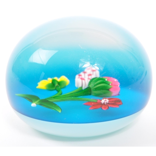 106 - Baccarat - A 20th century circa 1970s French Baccarat glass paperweight. The paperweight having blue... 