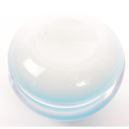 106 - Baccarat - A 20th century circa 1970s French Baccarat glass paperweight. The paperweight having blue... 