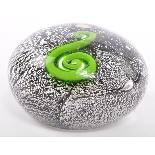 108 - A 20th century circa 1970s New Zealand art glass paperweight having silver azurine to surround of gr... 