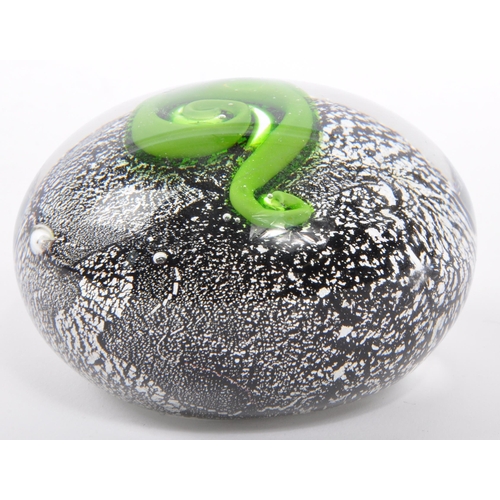108 - A 20th century circa 1970s New Zealand art glass paperweight having silver azurine to surround of gr... 