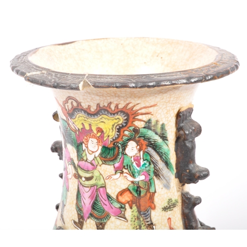 113 - A large early 20th century Chinese Nanjing baluster vase. The vase having crackle glaze and being ha... 