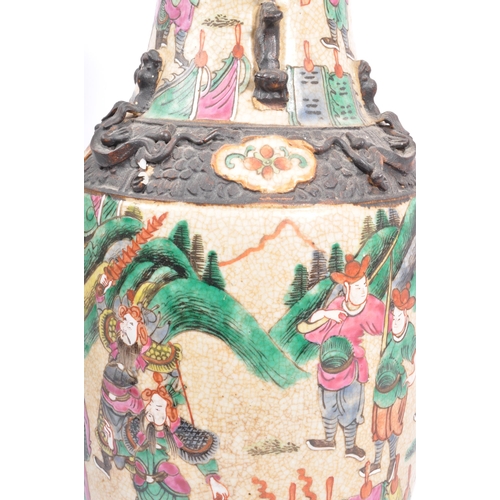 113 - A large early 20th century Chinese Nanjing baluster vase. The vase having crackle glaze and being ha... 