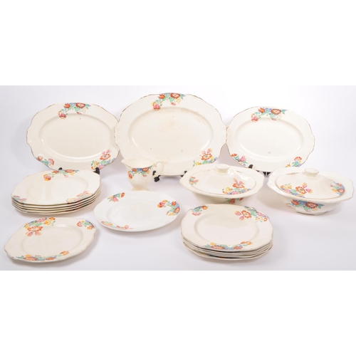 119 - A collection of vintage 20th century Alfred Meakin china cake plates, dinner plates, lidded tureens,... 