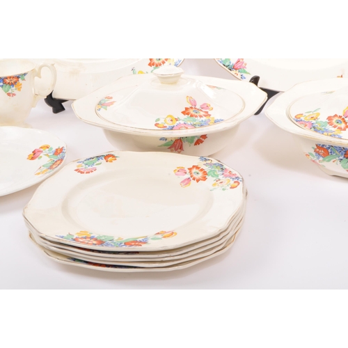 119 - A collection of vintage 20th century Alfred Meakin china cake plates, dinner plates, lidded tureens,... 