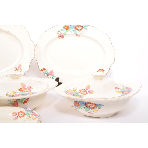 119 - A collection of vintage 20th century Alfred Meakin china cake plates, dinner plates, lidded tureens,... 