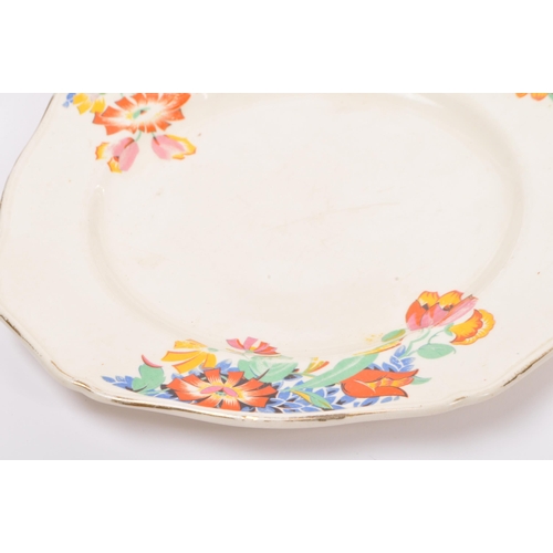 119 - A collection of vintage 20th century Alfred Meakin china cake plates, dinner plates, lidded tureens,... 