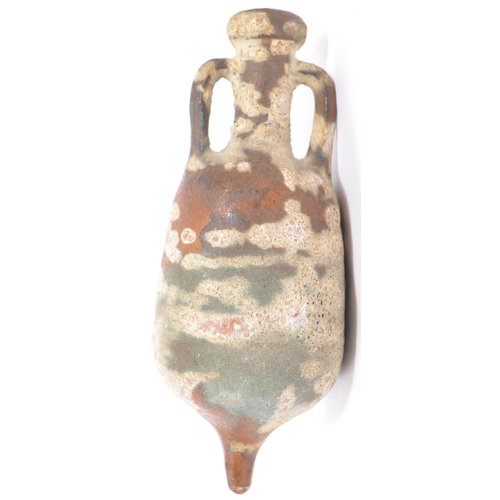 220 - A miniature reproduction Roman terracotta amphora wine vessel having twin handles and pointed base. ... 