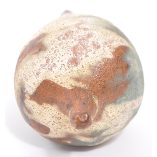 220 - A miniature reproduction Roman terracotta amphora wine vessel having twin handles and pointed base. ... 