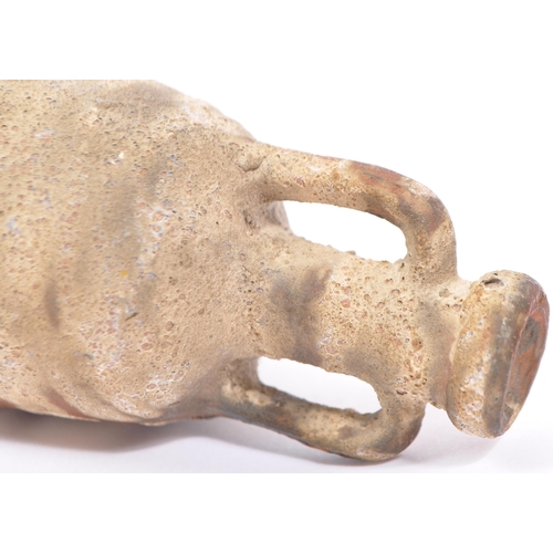 220 - A miniature reproduction Roman terracotta amphora wine vessel having twin handles and pointed base. ... 