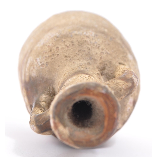 220 - A miniature reproduction Roman terracotta amphora wine vessel having twin handles and pointed base. ... 