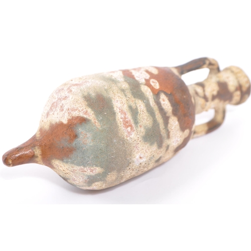 220 - A miniature reproduction Roman terracotta amphora wine vessel having twin handles and pointed base. ... 
