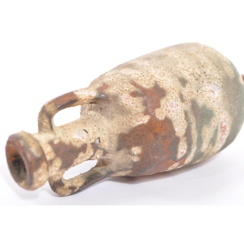 220 - A miniature reproduction Roman terracotta amphora wine vessel having twin handles and pointed base. ... 